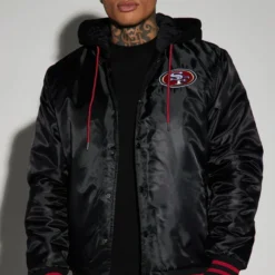 Front view of the 49ers Hooded Bomber Black Jacket, featuring a sleek black design with a hood, ribbed cuffs, and the San Francisco 49ers logo.