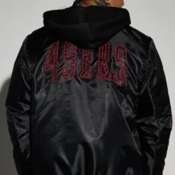 Back view of the 49ers Hooded Bomber Black Jacket featuring a sleek black design with bold 49ers branding.