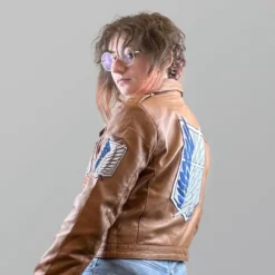 Side view of the Attack on Titan brown leather jacket, showcasing its premium material, detailed stitching, and emblem design.