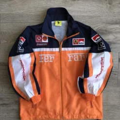 Front view of Ferrari Formula One Racing Orange Jacket featuring premium design and official team branding.