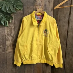 Front view of the Ferrari Magneti Marelli Grandprix Jacket, featuring Ferrari and Magneti Marelli branding with a sleek racing design.