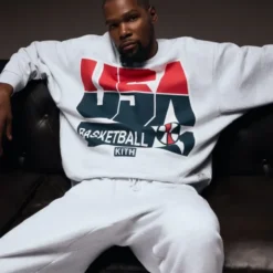 KITH Kevin Durant USA Basketball Crewneck in light grey, featuring bold USA graphics and branding.