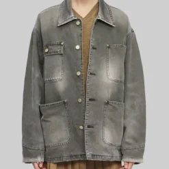 Front view of Katie Holmes Grey Denim Jacket featuring a vintage-washed look, button closure, and multiple pockets.