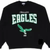 Kith X NFL Philadelphia Eagles Nelson Crewneck in black with bold 'Eagles' text and flying eagle graphic on the chest.