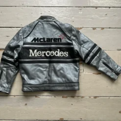 McLaren Mercedes leather jacket back view featuring McLaren and Mercedes embroidered branding on a sleek silver and black leather design.