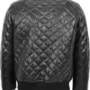 Back view of men’s black quilted leather jacket showcasing a diamond-stitched pattern and ribbed hem and cuffs.