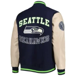 Back view of the Men’s Tommy Hilfiger College Seattle Seahawks Varsity Jacket, featuring bold team graphics and a vintage-inspired varsity design.