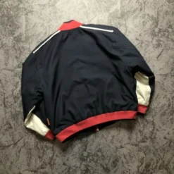 Michael Schumacher Ferrari Racing Jacket back view - navy blue with red and white accents, showcasing a sleek racing-inspired design.
