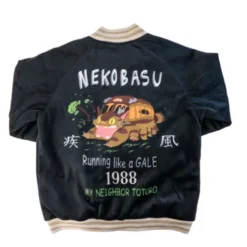 A black velvet jacket with an embroidered Catbus and the phrase "Running like a GALE 1988," celebrating the magic of My Neighbor Totoro.
