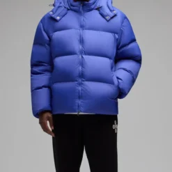 OVO Bounce Jacket in vibrant blue, front view with zipper closure and hood.