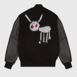 Black OVO For All The Dogs Varsity Jacket back view with bold embroidered animal graphic featuring red eyes.