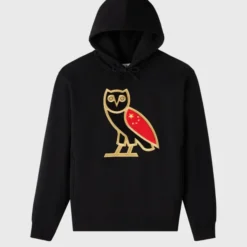 A black OVO International OG China Hoodie featuring a gold-trimmed owl logo with a red and gold Chinese flag design on its wing.