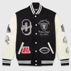 OVO Las Vegas Raiders Varsity Jacket featuring black and white design, embroidered Raiders logo, and team-inspired patches.OVO Las Vegas Raiders Varsity Jacket featuring black and white design, embroidered Raiders logo, and team-inspired patches.