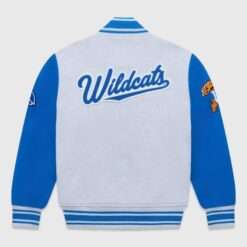 OVO NCAA Kentucky Wildcats Varsity Jacket back view with "Wildcats" embroidered text and team-inspired sleeve patches.