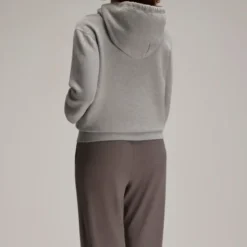 Back view of the OVO Relaxed-fit Full-Zip Hoodie in heather grey, showing the hood and ribbed hem details.