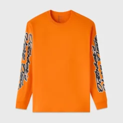 Bright orange OVO Sports Script long-sleeve T-shirt with bold black script graphics on both sleeves.