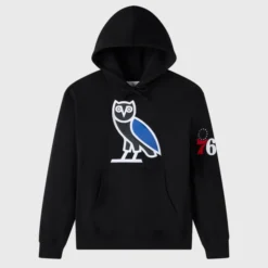 OVO x NBA Philadelphia 76ers Hoodie Front View – Black hoodie featuring OVO owl logo in blue and white, with 76ers branding on the sleeve.