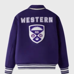 Back view of the OVO x Western Campus Varsity Jacket in purple, featuring "WESTERN" lettering and the university crest.