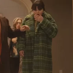 Selena Gomez wearing a green plaid coat in Only Murders in the Building Season 3.