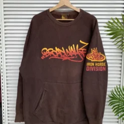 PNB Nation Rap Sweatshirt in brown with graffiti-style front print and sleeve design.