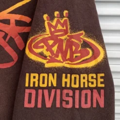 Closeup of PNB Nation Rap Sweatshirt sleeve with graffiti and Iron Horse Division print.