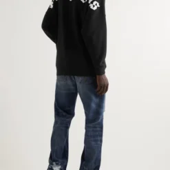 Palm Angels Logo-Print Cotton Hoodie with a bold white logo across the back.