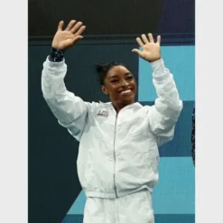 Paris Olympics 2024 Team USA Simone Biles White Jacket Front View, featuring a lightweight design with USA flag patch and zip-up closure.