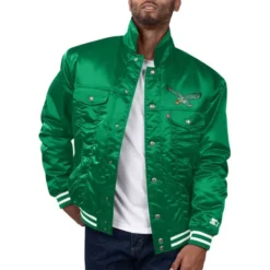 Front view of the Philadelphia Eagles Silver Tab Trucker Jacket in shiny green satin, featuring an embroidered Eagles logo and button-up closure.