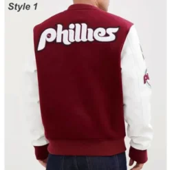 Philadelphia Phillies Letterman Jacket showcasing a bold 'Phillies' logo across the back with burgundy wool body and white leather sleeves.