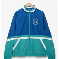 A blue and teal windbreaker jacket with a zip-up front, featuring a "Sailor Uranus & Sailor Neptune" emblem on the chest.