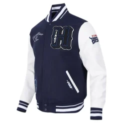 Front view of Pro Standard Navy Howard Bison HBCU Varsity Jacket featuring embroidered 'H' logo, Howard Bison patches, and white leather sleeves.