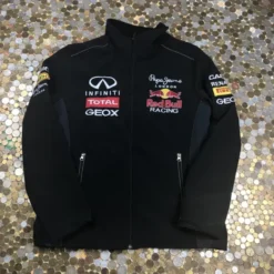 Red Bull Racing Jacket front view featuring sponsor logos like Infiniti, Total, Geox, and Pepe Jeans on a sleek black design.