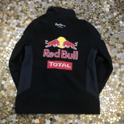 Red Bull Racing Jacket back view with bold Red Bull and Total branding on a black sporty design.