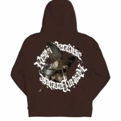 Chocolate brown hoodie with a striking graphic of St. Michael defeating a demon, surrounded by the phrase "Rest in Paradise" in gothic white lettering.