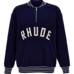 Rhude Quarter Zip Varsity Sweatshirt in navy blue with bold RHUDE lettering on the front and striped ribbed trims.