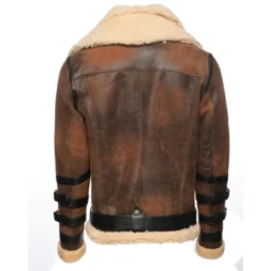 Rear side of Richard’s Vintage Aviator Bomber Shearling Jacket, showcasing brown distressed leather, a shearling hem, and strap accents on the sleeves.