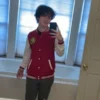 A stylish red and white varsity jacket with a bold "R" emblem on the chest, featuring white sleeves and striped ribbed cuffs.