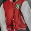 A closer look at the Robin varsity jacket highlighting the embroidered 