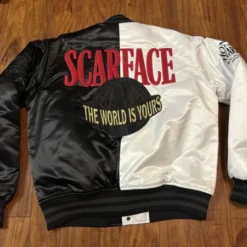 Back view of the Scarface X Shoe Palace The World Is Yours Satin Jacket featuring red ‘SCARFACE’ text, a bold globe graphic, and ‘The World Is Yours’ embroidery.