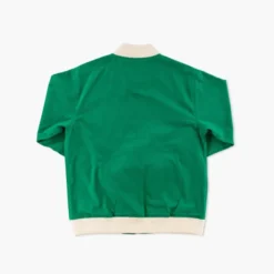 Solid green back of the Seattle SuperSonics cotton jacket with a white ribbed collar and waistband.