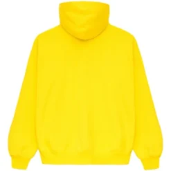 Solid yellow Sp5der Legacy Hoodie with a plain back design and a relaxed fit.