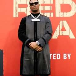 Abdul Carter 2025 NFL Draft Green Bay Penn State Velvet Accents April 24 Long Black Coat, an elegant long black coat with velvet accents worn by Abdul Carter at the 2025 NFL Draft.