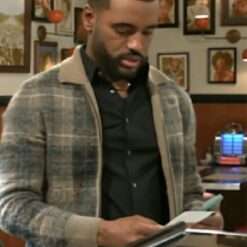 Beyond the Gates 23 April 2025 Andre Richardson’s Brown Plaid Zip Cardigan Sweater, a warm and stylish layer featuring a classic plaid design worn by Andre Richardson.