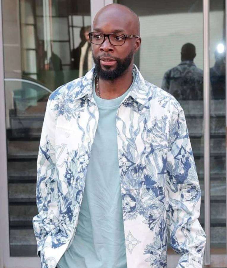 Lassana Diarra Football Match Printed Jacket 1 Lassana Diarra sports a printed jacket during a football match, featuring dynamic designs and bold graphics that reflect his energetic style both on and off the field.