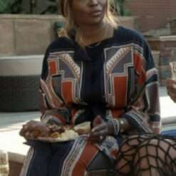 Cynthia Bailey from The Real Housewives of Atlanta Season 16 stuns in a long shirt, combining elegance and comfort with its flowy silhouette and chic design.