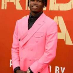 Travis Hunter 2025 NFL Draft Red Carpet Green Bay Wisconsin April 24 Jaguars No. 2 Pick Pink Blazer, a striking pink blazer worn by Travis Hunter at the 2025 NFL Draft red carpet.
