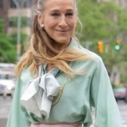 Sarah Jessica Parker wearing elegant bow blouses from And Just Like That – stylish women's tops featuring statement neck ties and chic, sophisticated design.