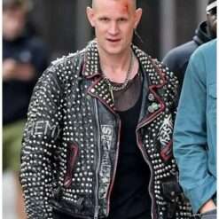 Matt Smith wearing a studded leather jacket from Caught Stealing 2025 – edgy men's jacket featuring metal stud embellishments, classic biker style, and sleek black leather.