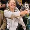 Kate Hudson Lakers Game Jacket pose