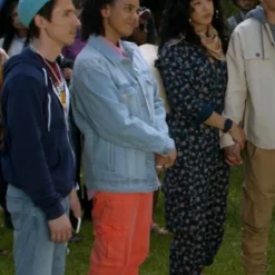 Aubrey in Leverage: Redemption Season 3 wearing a stylish wolf-print jumpsuit – full-length design with fitted waist and bold pattern.